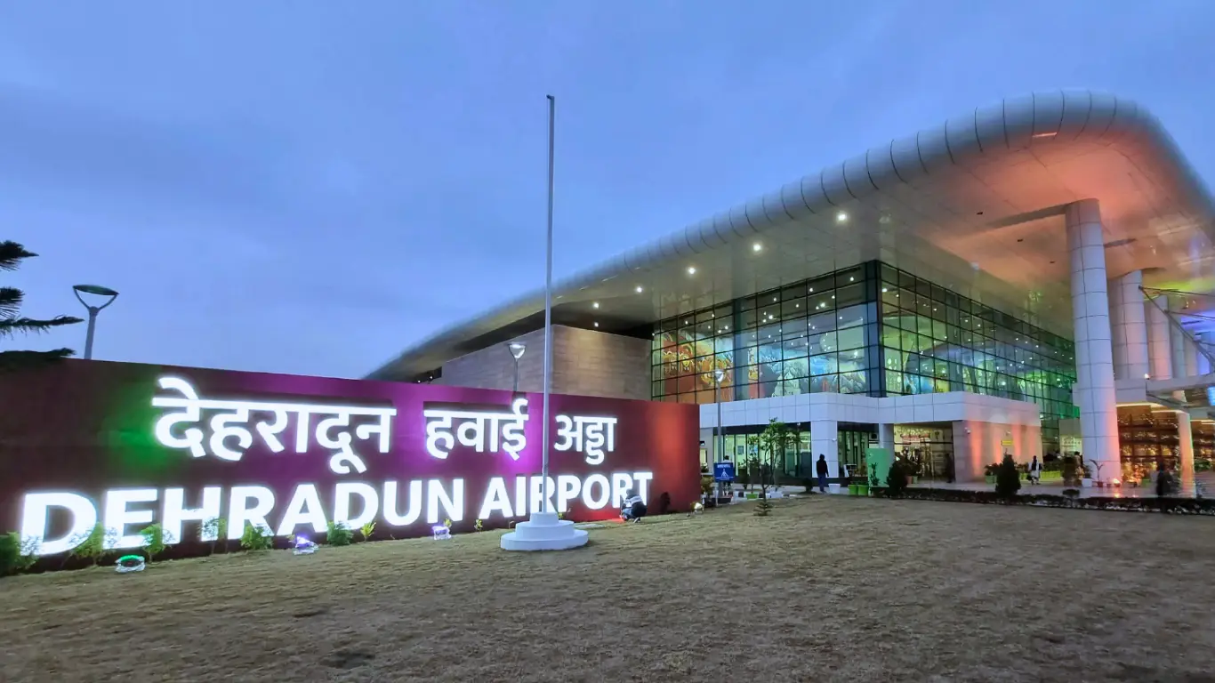 Dehradun Airport night view with terminal building for Dehradun Airport to Haridwar taxi service pickup