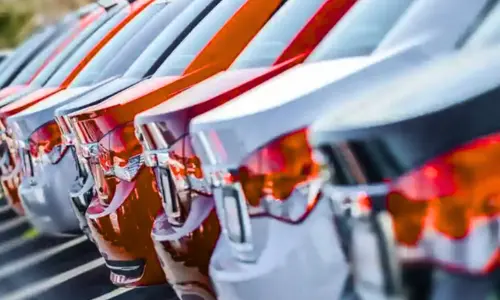 multiple taxi cars lineup showing dehradun airport taxi fare per kilometer with clean and well maintained fleet