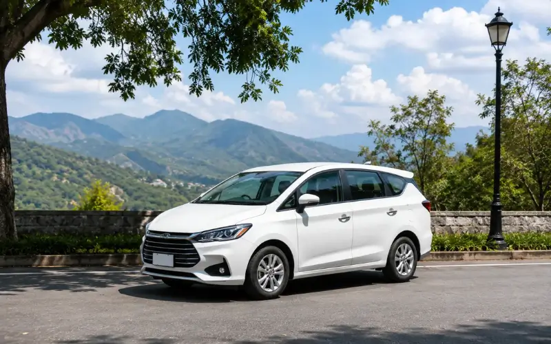 White taxi for Dehradun Airport to Mussoorie taxi service on clean road route