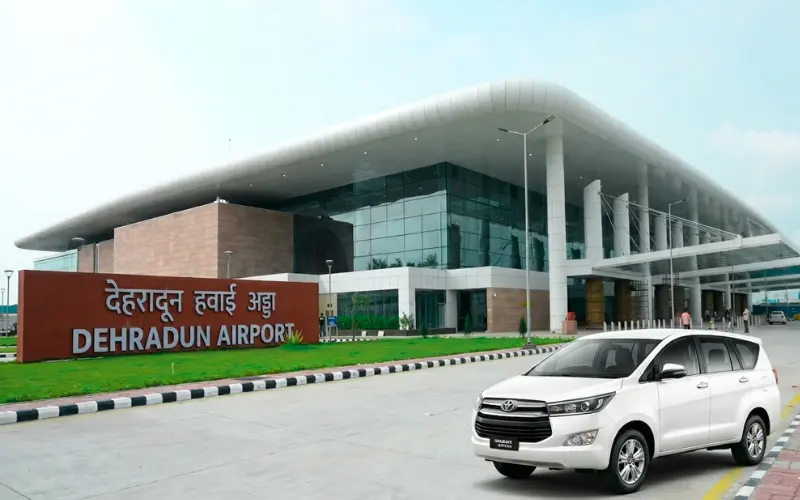 Dehradun Airport to Rishikesh taxi service with Innova cab parked at Jolly Grant Airport for comfortable travel