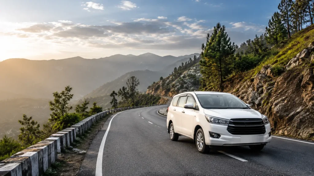 Dehradun Airport to Rishikesh taxi service with Innova car driving on scenic hill road